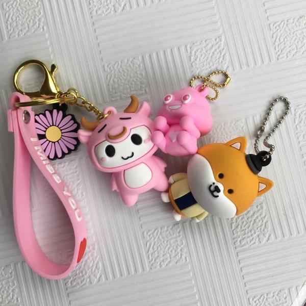 Buy Creative Holographic PVC Anime Figures Cartoon Key Chain Charms at wholesale prices