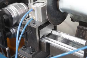 Quality 0.5-1.2MM Shutter Roll Forming Machine with Continuity punch Punching 56mm Shaft for sale