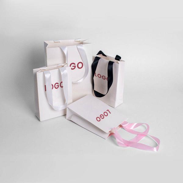 Custom Logo Matt Paper Clothing Packaging Gift Paper Bag With Ribbon Handle For Your