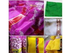 Quality PP Woven Garlic Mesh Bag Vegetable Packing Bag Drawstring Woven Mesh Sacks for sale
