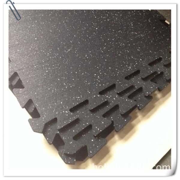 Interlocking rubber gym flooring tiles in multiple colors