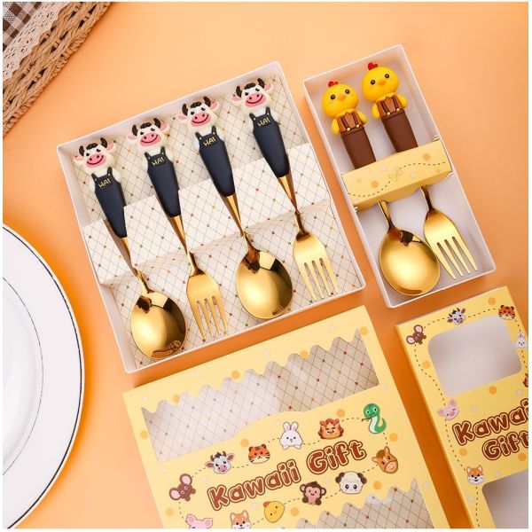 Cartoon animal silicone spoon and fork set showing multiple zodiac designs