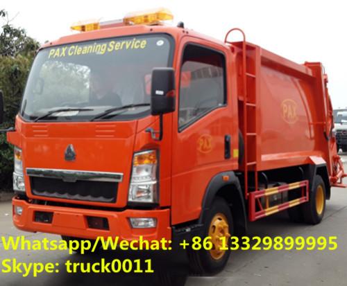Buy SINO TRUK HOWO 4*2 RHD 5CBM 4tons wastes collecting vehicles, refuse garbage trucks customized for Timor-Leste clients at wholesale prices