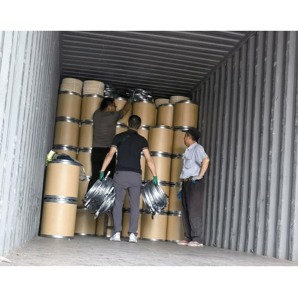 Stackable 20L Fiber Drums in warehouse setting