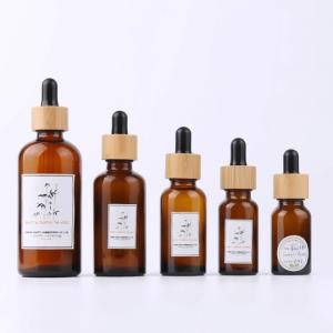 China 0.34oz 10ml Amber Glass Essential Oil Dropper Bottle With Eye Dropper Bamboo Cosmetic Bottles on sale