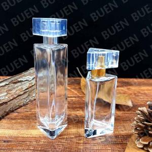 China Eco Friendly Triangle Small Glass Perfume Bottle With Acrylic Cap 1oz on sale