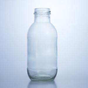 China 300ml Round Glass Milk Bottle with Lid Liquor Storage Solution Decal Surface Handling on sale