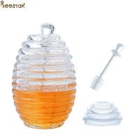 China Two Types Transparent Bee Honey Pot and Spoon With Stirring Rod Crystal Mini Honey Jar for sale