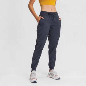 Buy cheap Fashion Woven Fabric Women's Loose Fit Pocket Yoga Pants For Autumn Winter from wholesalers