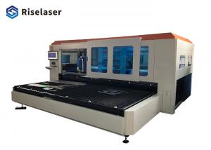 China Enclosed Type Fiber Laser Cutting Machine With Double Working Platfrom 1kw on sale