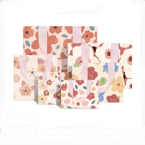 Quality High End Oli Printing Flowers Style Cosmetic Clothing Shopping Paper Gift Packaging Bag with Logos for sale