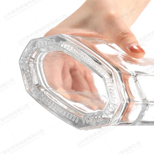 Customized 750ml End XO Transparent Glass Wine Bottle with Rubber Stopper Sealing Type