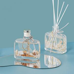 China Unique Bottles Gift Box Cover Container Ocean Scented Oil Glass Reed Diffuser on sale