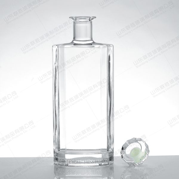 Customized 750ml End XO Transparent Glass Wine Bottle with Rubber Stopper Sealing Type