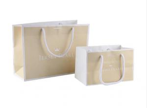China Customized Size Paper Shopping Bags With Silk Ribbon / Circle Tube Handle on sale