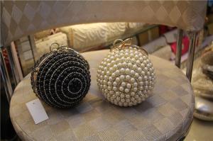 Quality Round high-grade pearls evening bags woman holding a high-end fashion evening bag bride for sale