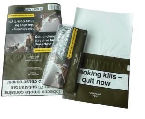 China Custom plastic 30g Rolling Tobacco Plastic Pouch with Adhesive on sale