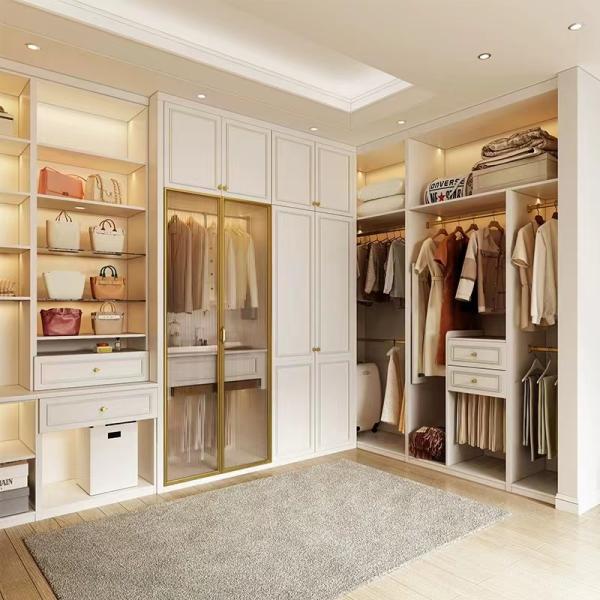 Custom walk-in wardrobe unit with white shaker style doors
