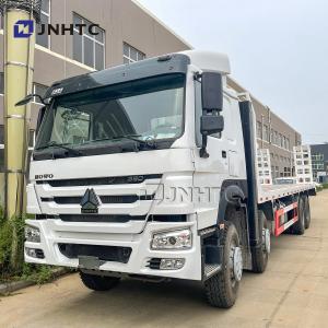Quality HOWO Cargo Truck For Eacavator Construction Machinery Transport Flatbed Trailer for sale