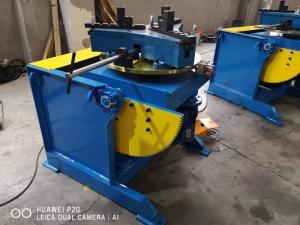 China Manual Tilt Turntable Rotary Welding Positioner 300kg Loading Foot Pedal Control on sale