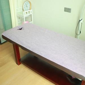 China Pp Spun Bond Waterproof Disposable Bed Sheet Roll With Cross Whole on sale