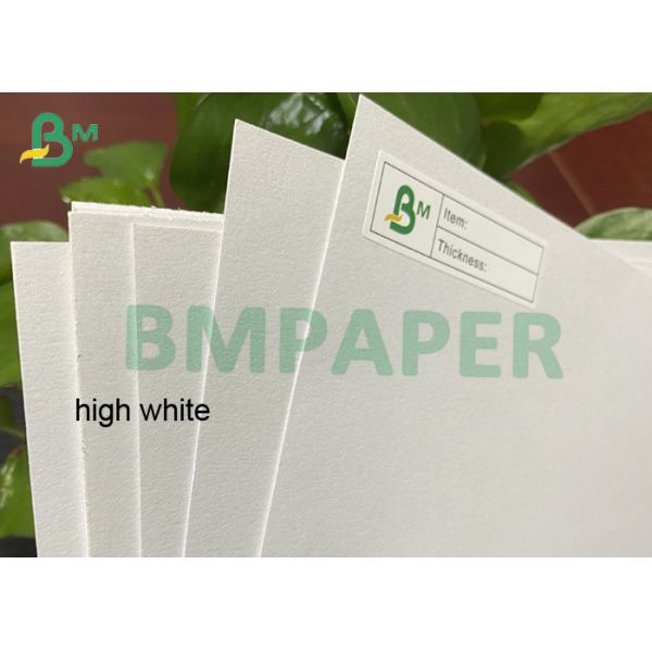 High white absorbent paper