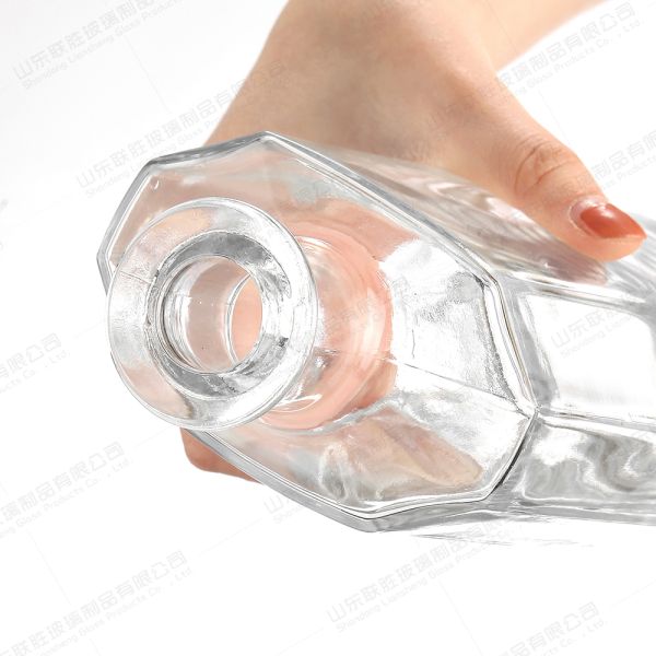 Customized 750ml End XO Transparent Glass Wine Bottle with Rubber Stopper Sealing Type